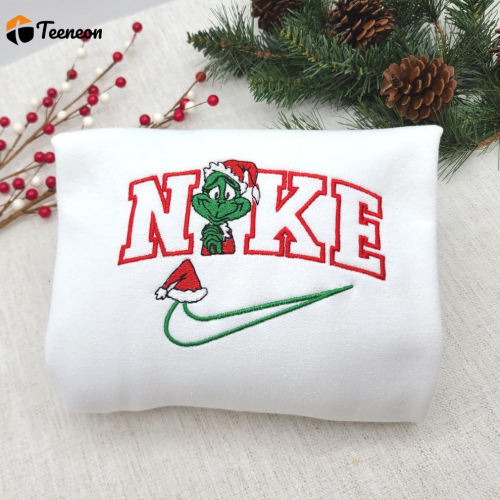 Get Festive with our Embroidered Grinch Christmas Sweatshirt – Cozy Holiday Attire for All!